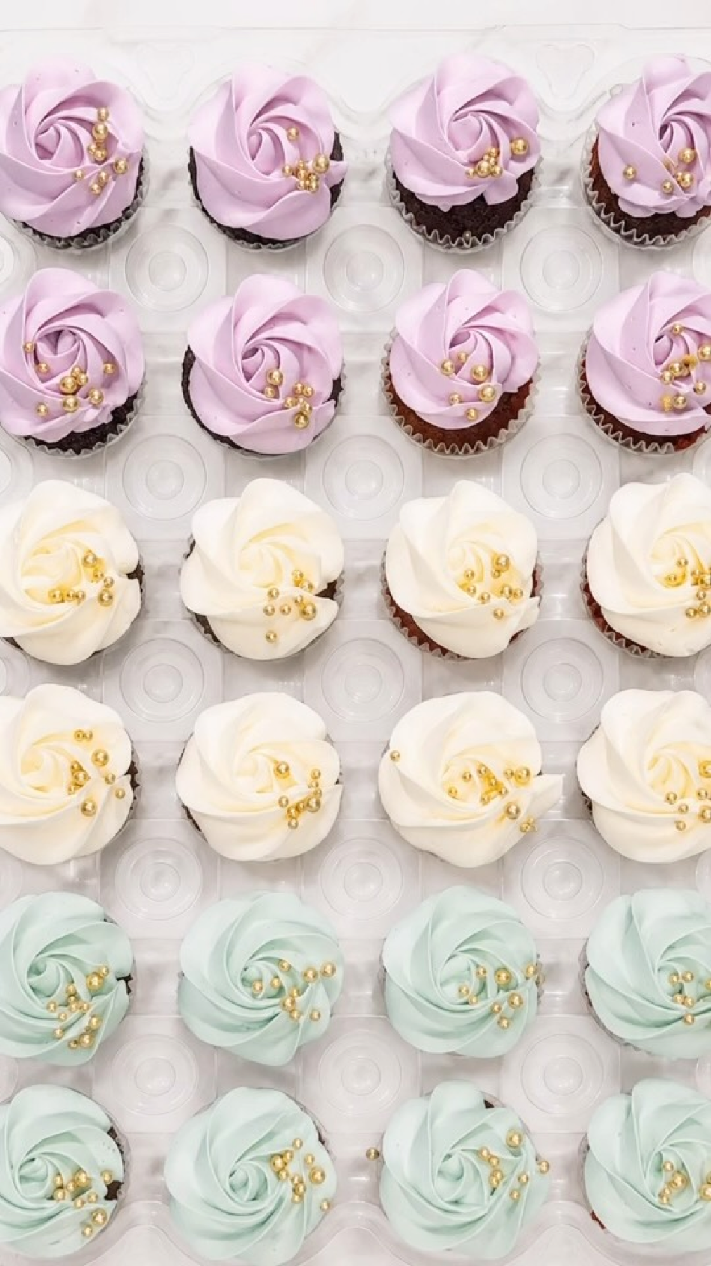 Lavender, ivory, and mint cupcakes with gold pearls