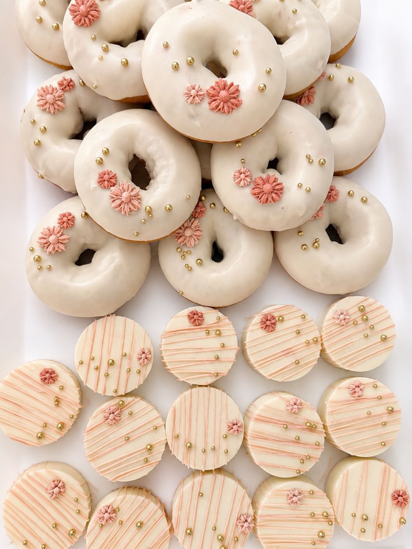 Assorted donuts and chocolate covered Oreos